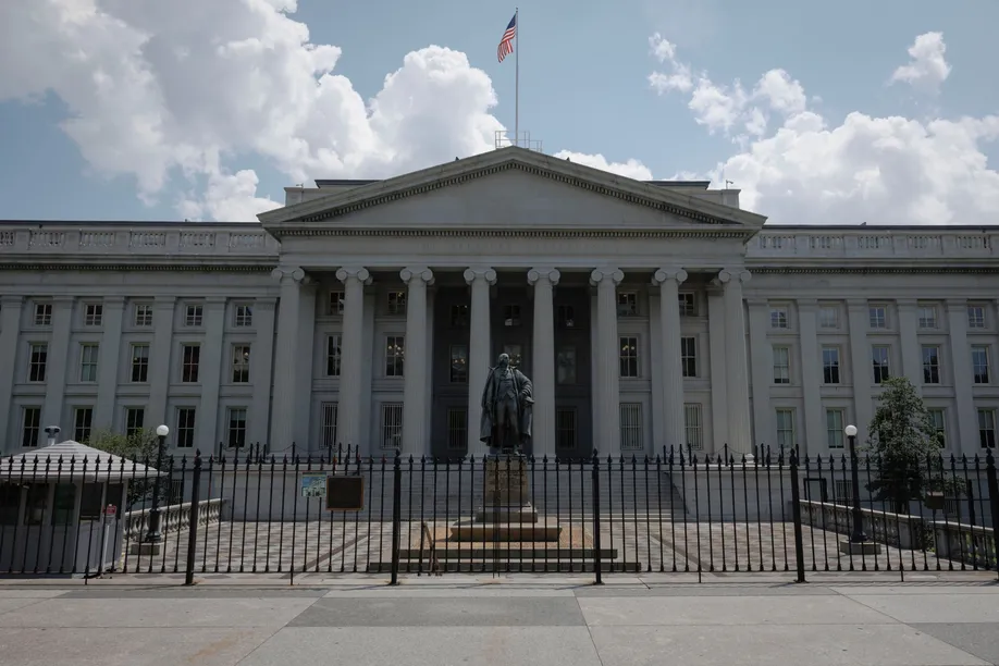 The U.S. Treasury Department building facade with a statue in front